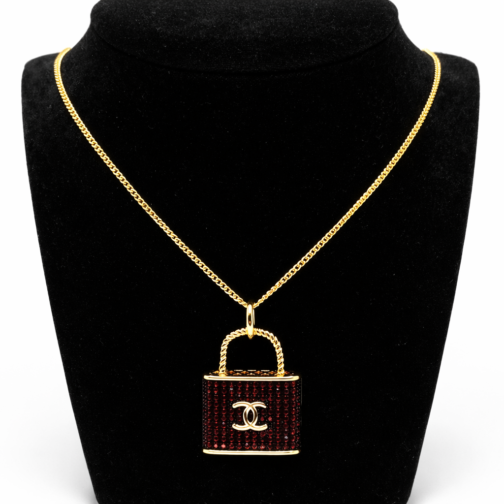 Purple Crystal Lock Pendant Necklace – Red & Gold Double Emblem