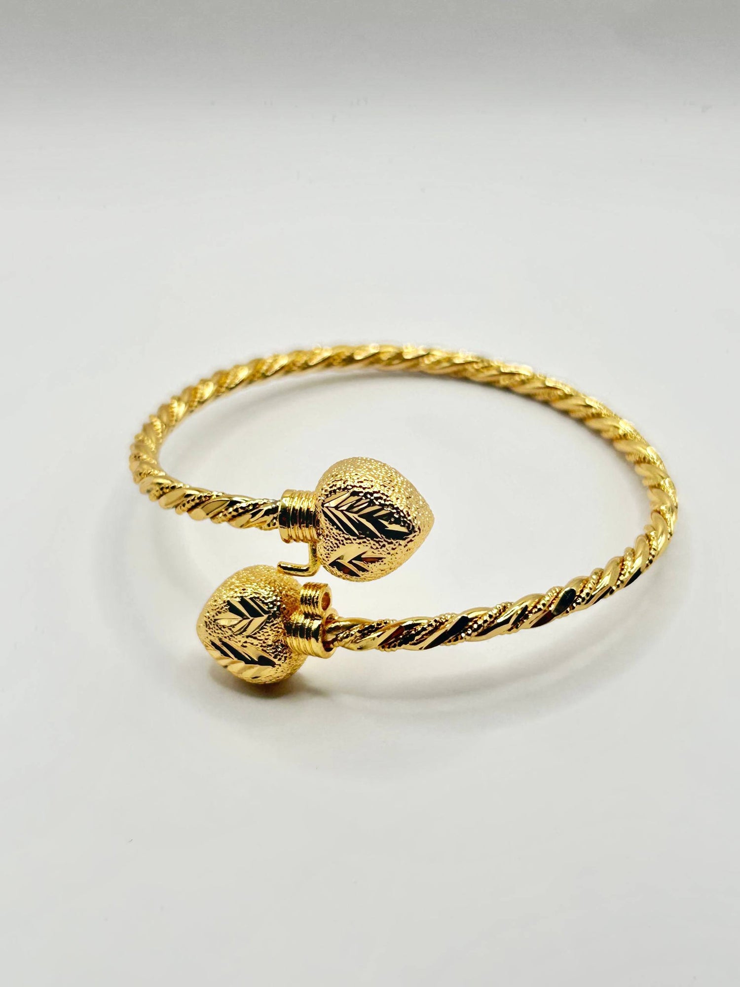 Twisted Texture Dual Sphere Cuff Bracelet – Gold Colored